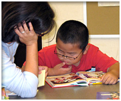 Children practicing their reading skills